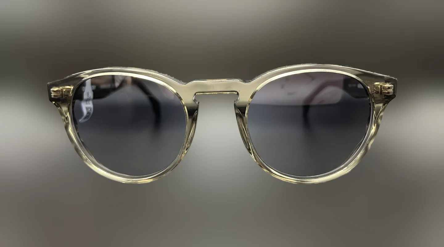 Sonnenbrille mit transparent olivfarbener Fassung und grauen Gläsern